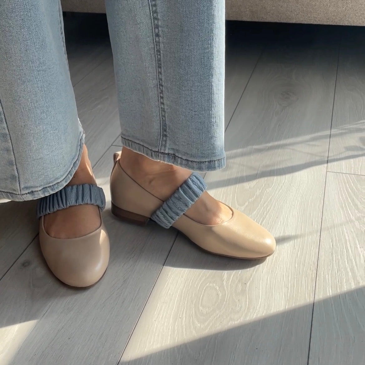 Cream ballerina with a blue ruched strap