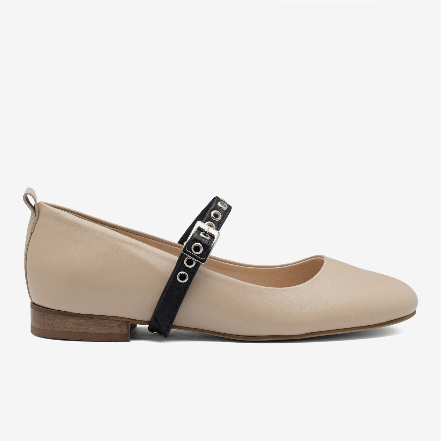 Cream ballerina flat with a single strap and silver hardware